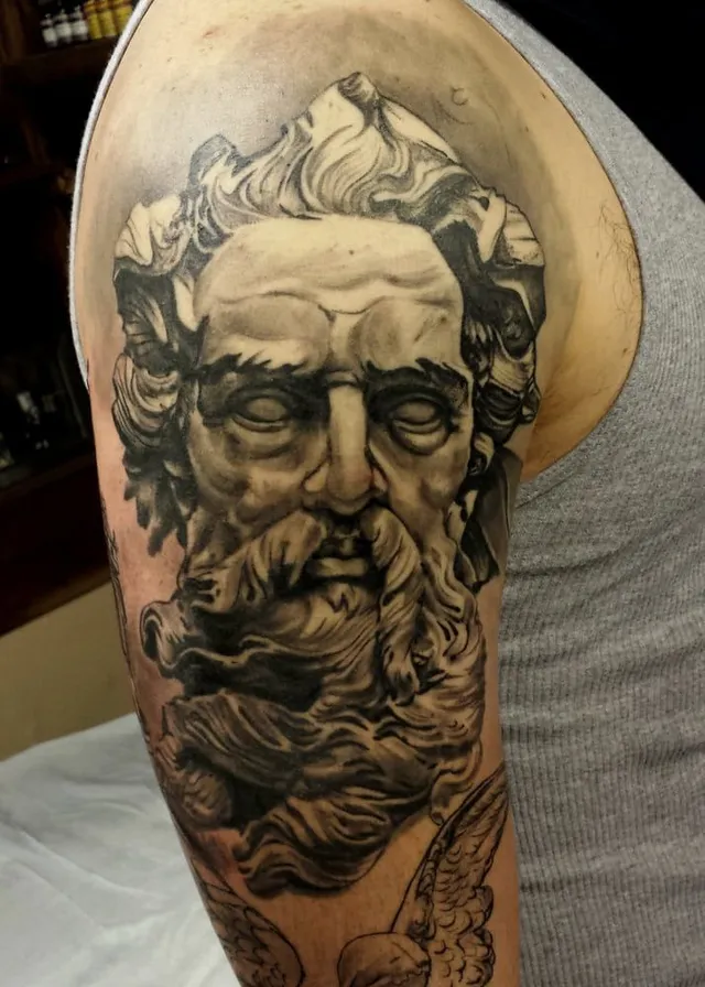 Black and grey portrait tattoo by Mission Ink artist